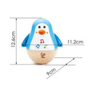 Pinguim Musical Sensorial Balançante Premium Com Movimento e Som Suave – Hape